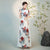 Half Sleeves Cheongsam Top Vietnamese Ao Dai Dress Floral Dress includes Loose Pants