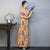 Elegant Half-Sleeve Floral Ao Dai Dress with Loose Pants