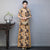 Elegant Half-Sleeve Floral Ao Dai Dress with Loose Pants