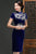 Vestido chino cheongsam de terciopelo con bordado floral en el cuello hasta la rodilla