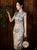 Ojo de cerradura Cuello Manga casquillo Cheongsam tradicional Hasta la rodilla Vestido chino floral